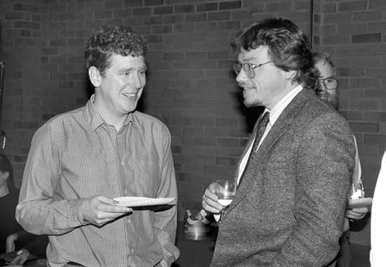 Professor David Goodwin (left) and Professor Murray McArthur (right) chat at the Writing Awards celebration on March 28, 1989
