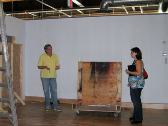 Dr. Neil Randall and Dr. Stacey Scott (Systems Design Engineering) inspect the construction in the CML on August 3, 2010
